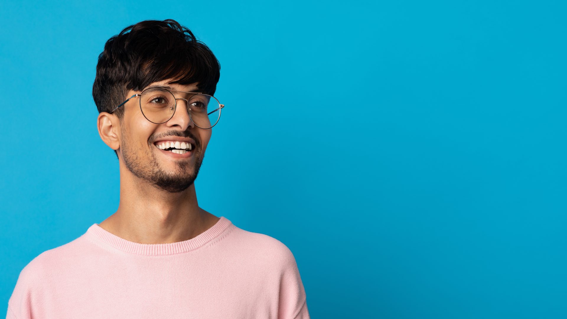 closeup-portrait-of-cheerful-indian-guy-looking-at-2023-11-27-05-27-55-utc